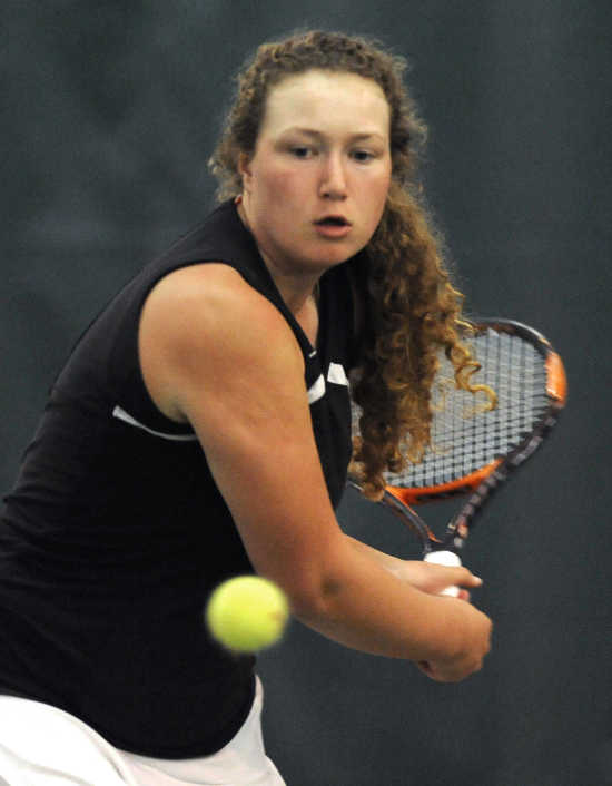 Jackson's Jenny Powell returns a volley against Dexter in singles action